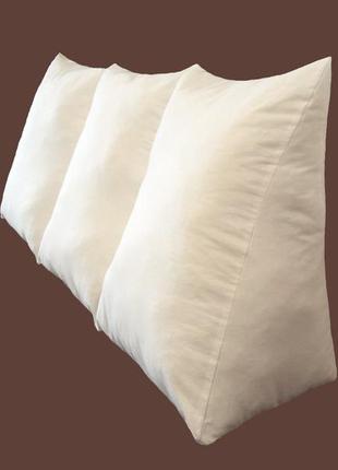 Велика довга трикутна подушка. без наволочки в комплекті. кольорова. біла1 фото