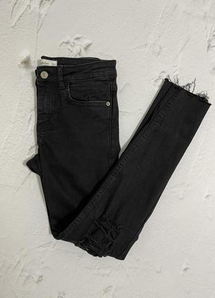 Джинси з розрізами на колінах mango