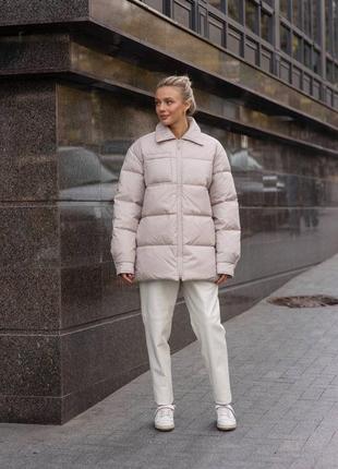 Тепла зимова куртка на пуху