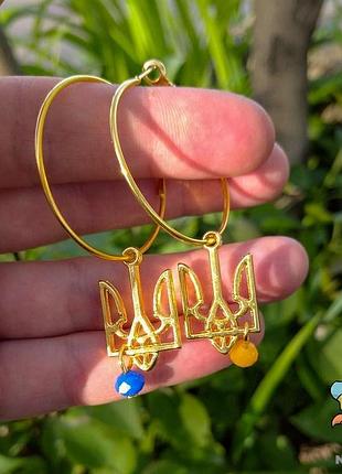 Сережки "герб україни 25*15 мм. кільця. колір золото