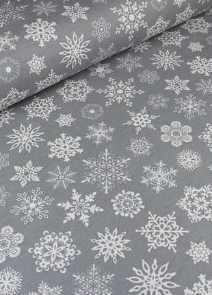 Новогодняя ткань, для штор, скатертей, салфеток, турция, снежинки белые на сером1 фото