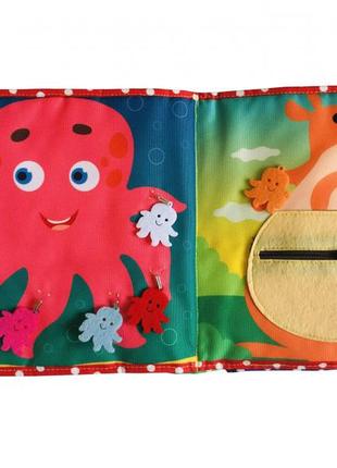 Текстильна розвивальна книга для малюків bambini "поні" 4036795 фото