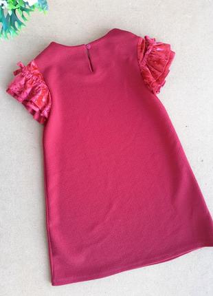 Яскрава червона фактурна сукня з велюровими рукавами на 7 років2 фото