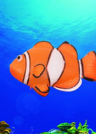 Искусственная рыбка клоун, оранжевая, силиконовая и люминисцентная (светящая )декор в аквариум - размер 4*6 см