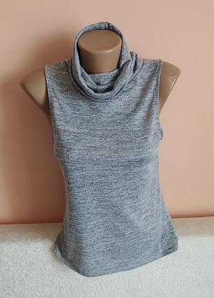 Как новый,в идеале!гольфик,гольф или водолазка, указано р. 10.