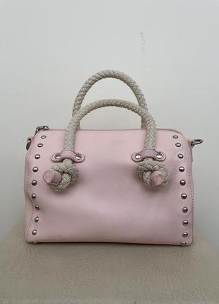 Рожева вмістка жіноча сумка