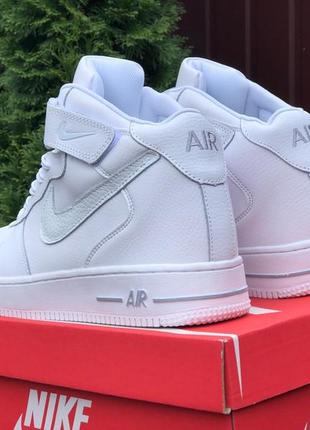 Зимові кросівки nike air force 1 high white silver4 фото