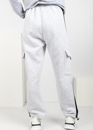 Жіночі зимові теплі спортивні штани на флісі з кишенями4 фото