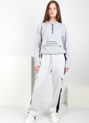 Жіночі зимові теплі спортивні штани на флісі з кишенями3 фото