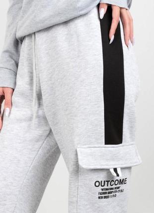 Жіночі зимові теплі спортивні штани на флісі з кишенями2 фото