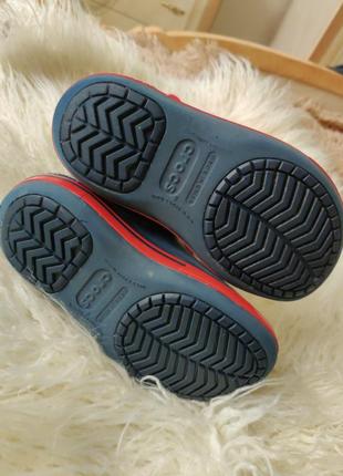 Сапоги фірми crocs розмір j1. устілка приблизно 20 см. по підошві 22 см. устілки як такої нема, вони всередині обшиті кольоровою тканиною.2 фото