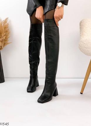 Женские стильные кожаные зимние сапоги на каблуке черные2 фото