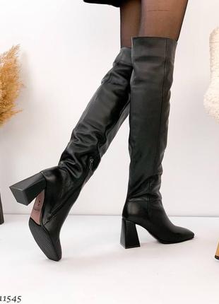 Женские стильные кожаные зимние сапоги на каблуке черные7 фото