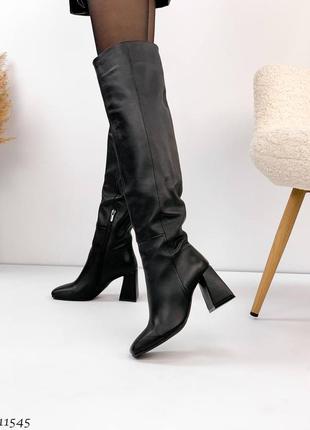 Женские стильные кожаные зимние сапоги на каблуке черные8 фото