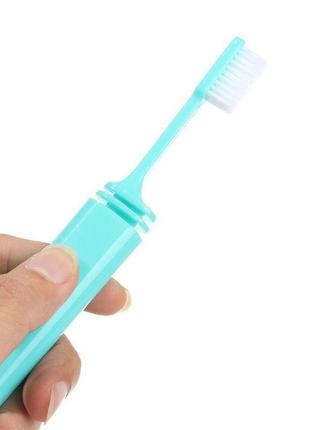 Портативна складна зубна щітка в дорогу 10*2см3 фото