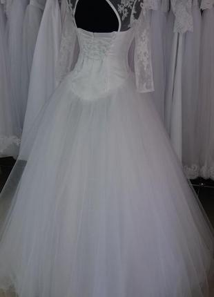 Свадебное платье классическое, белого цвета, с рукавом3 фото