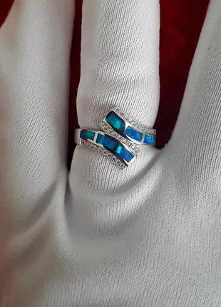 Что подарить серебряное кольцо с камнем голубой опал женское6 фото