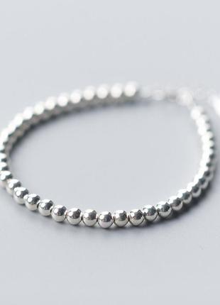 Женский серебряный браслет с бусинками серебро1 фото