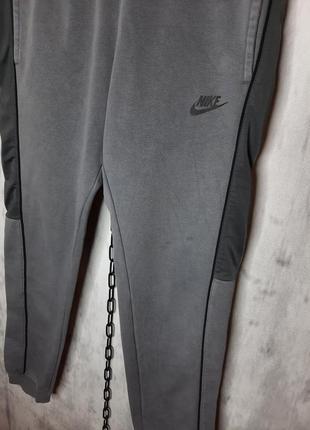Крутые оригинальные мужские серые спортивные штаны nike nsw3 фото