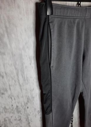 Крутые оригинальные мужские серые спортивные штаны nike nsw4 фото