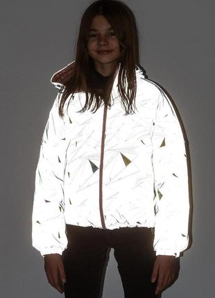 Двостороння світловідбиваюча куртка трикси2 фото