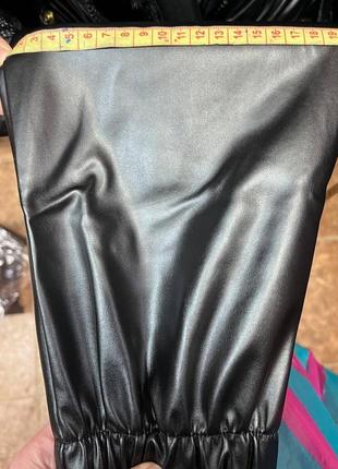 Теплі шкіряні жіночі  брюки на манжетах (джогери ) з широкою резинкою і косими кишенями4 фото