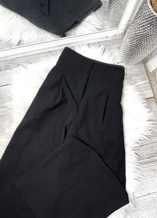 Чёрные широкие брюки5 фото