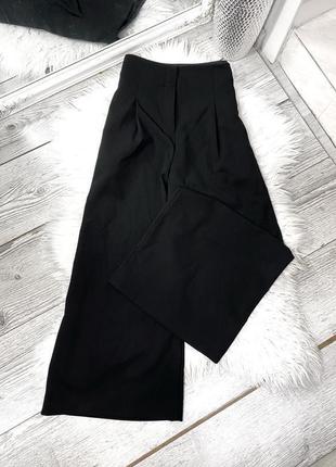 Чёрные широкие брюки2 фото