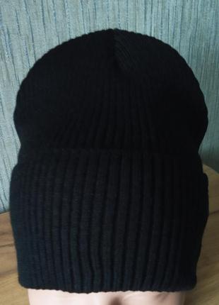 Молодіжна в'язана шапка шапочка з відворотом на мікрофлісі середньої щільності чорного кольору1 фото
