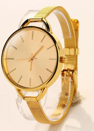 Жіночі годинники браслет geneva золотого кольору1 фото