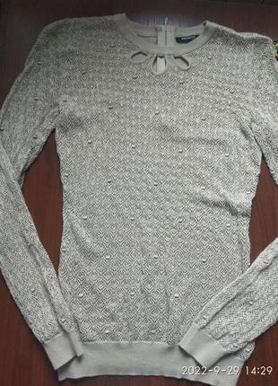 Ошатна трикотажна кофтина з ажурною в'язкою orsey