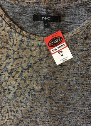 Очень красивая и стильная брендовая кофточка.