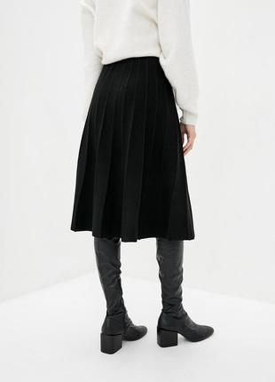 Женская трикотажная юбка черного цвета. модель uw870. размер 42/442 фото
