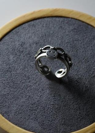 Безразмерное мужское кольцо "смайлик" из нержавеющей стали1 фото