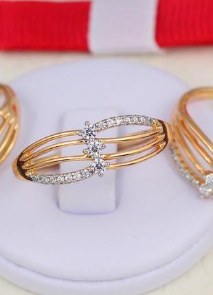 Кольцо xuping jewelry с родием с тремя камнями на тонких полосках  р 20 золотистое1 фото