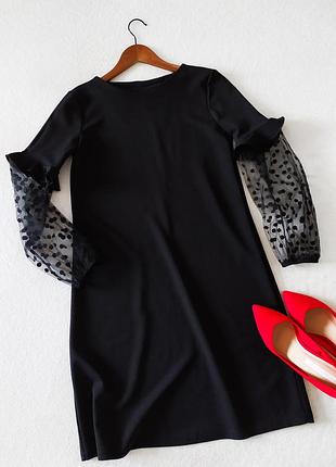 Чорна сукня з оригінальним рукавом сітка