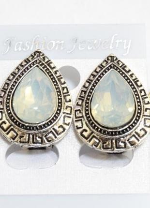 Кліпси з місячним каменем в оправі "меандр" крапля