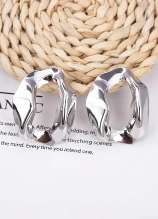 Стильні сережки біжутерія жіночі сріблясті nm872-s