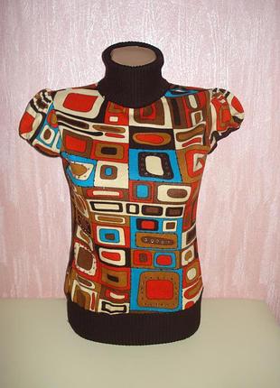 Гольф з коротким рукавом. розмір s. в ідеальному стані.