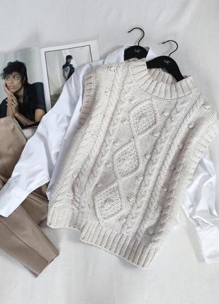 Жилет, безрукавка