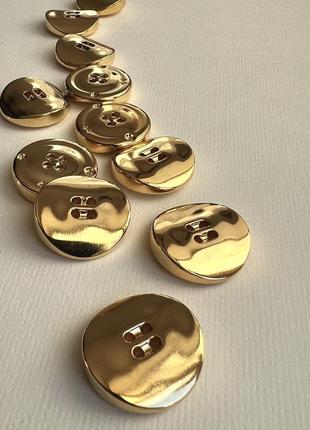 Гудзик пальтовий гладкий 4отв золотий 27мм пластик