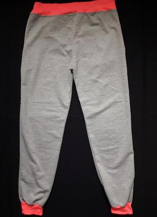 Круті трикотажні спортивні штани з написами azn2 фото