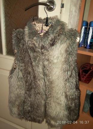 Жилетка безрукавка