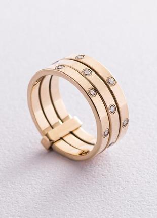 Золоте жіноче потрійне кільце з фіанітами 
к02620