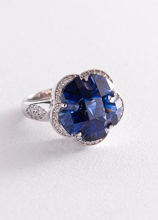 Золотое кольцо "цветок" с синим сапфиром 
к1005