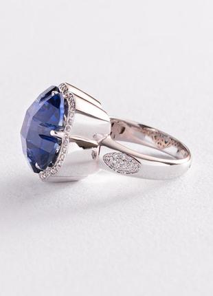 Золотое кольцо "цветок" с синим сапфиром 
к10055 фото