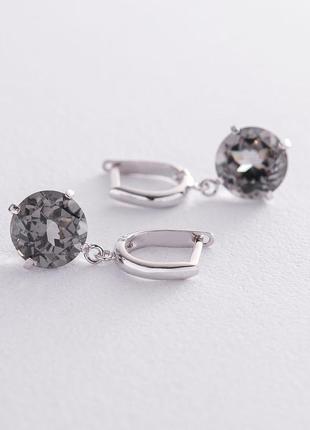 Золотые серьги "влечение" с синтетическим 
топазом с05287