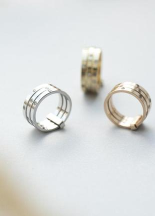 Тройное золотое кольцо с фианитами к026216 фото