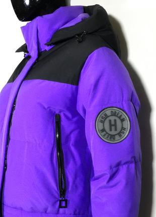 Жіноча яскрава зимова куртка фіолетового кольору7 фото