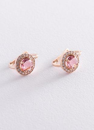 Золоті сережки з рожевими та білими фіанітами 
с074654 фото